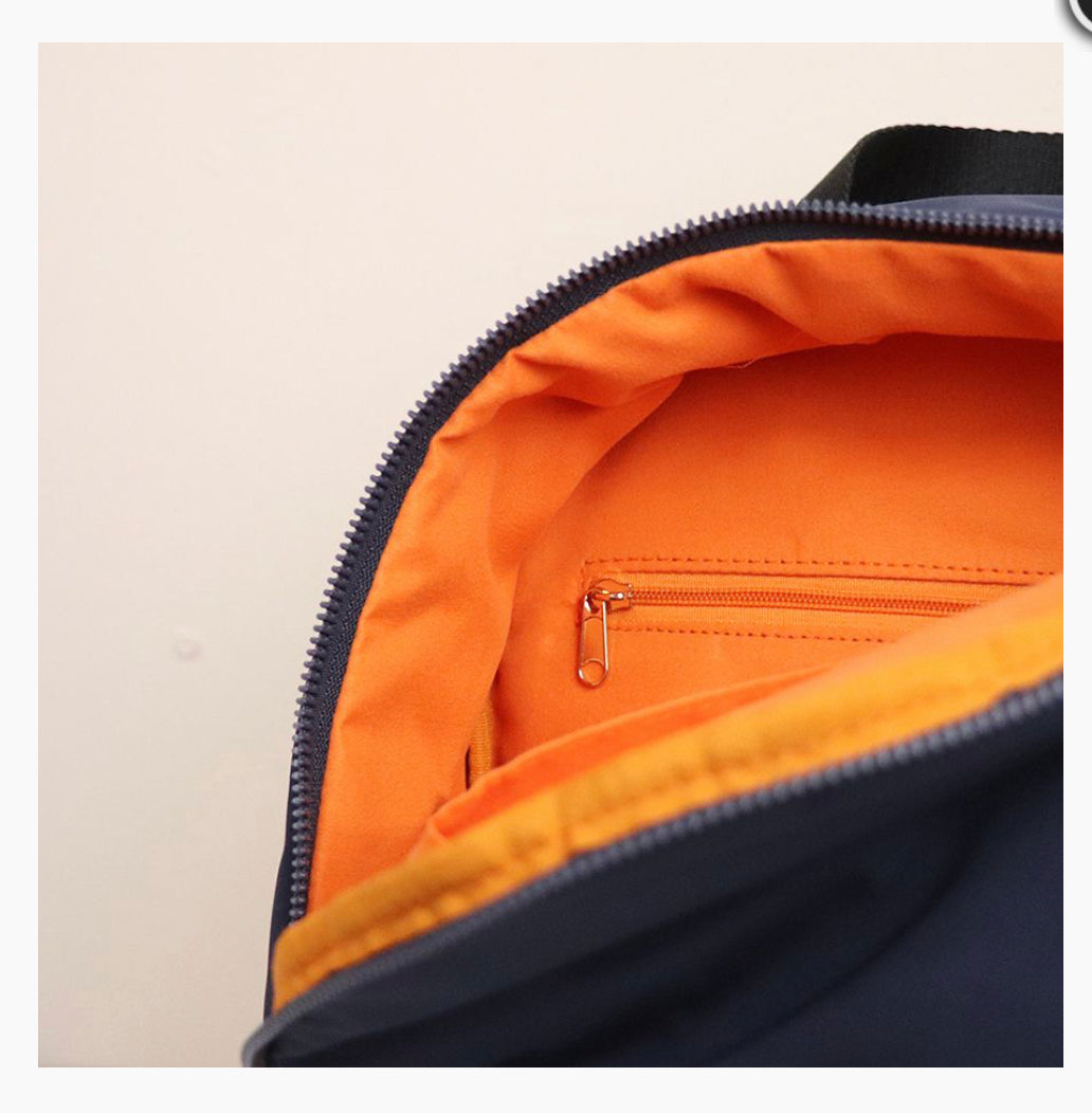 RECYCLED POLYESTER BACKPACK WITH ORANGE LINING & EXTERNAL ZIP POCKET