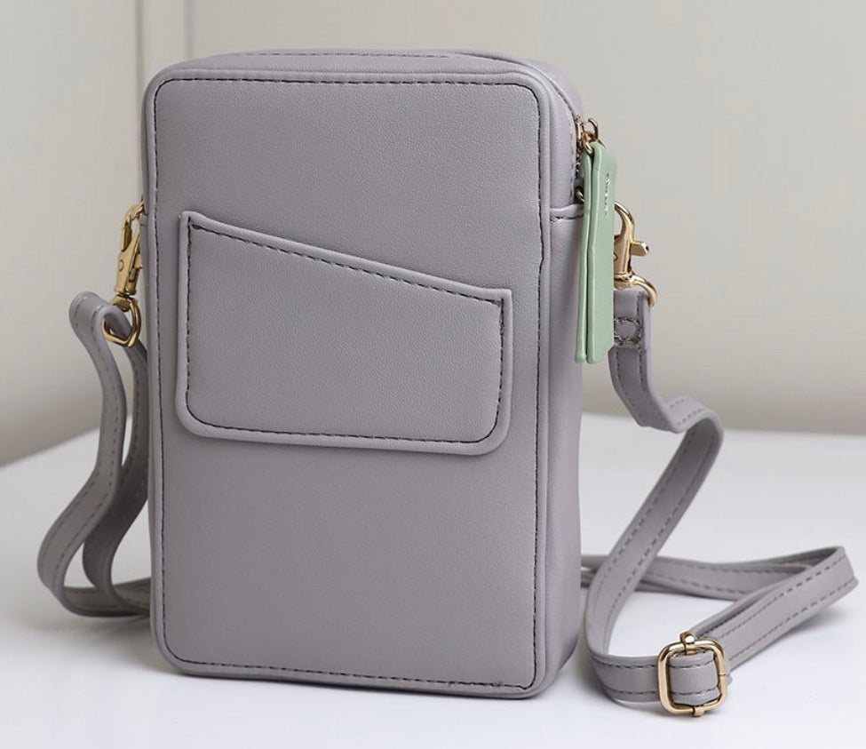 GREY VEGAN LEATHER PHONE BAG WITH GREEN ZIP TASSEL AND REMOVEABLE STRAP