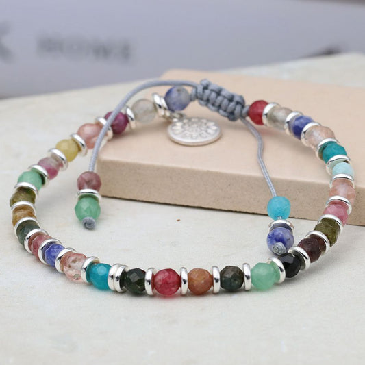 Silver plated tiny discs and mixed bead cord bracelet