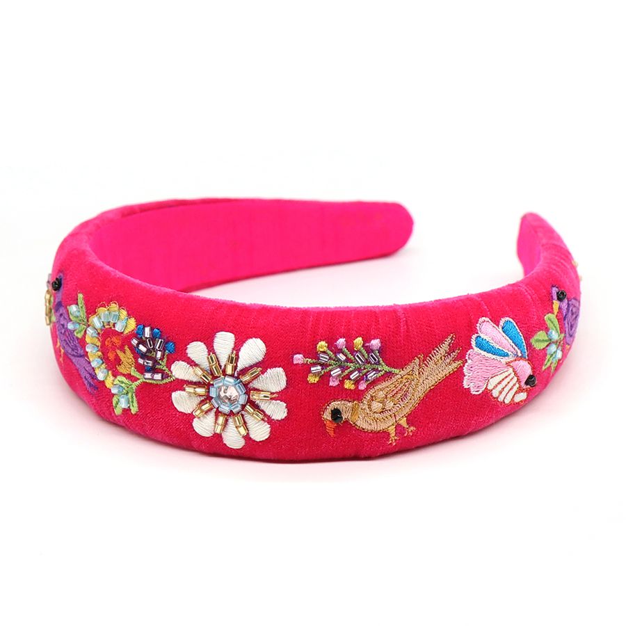 Vibrant pink velvet padded peacock headband